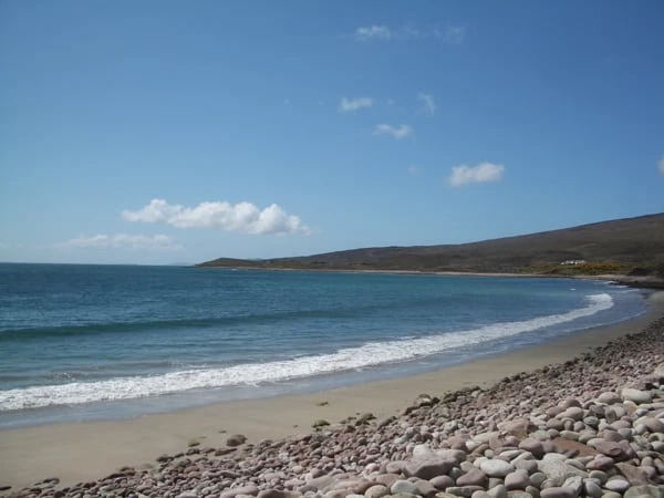 Rocky beach under clear skies in Mayo, perfect for stargazing during the Mayo Dark Sky Festival.